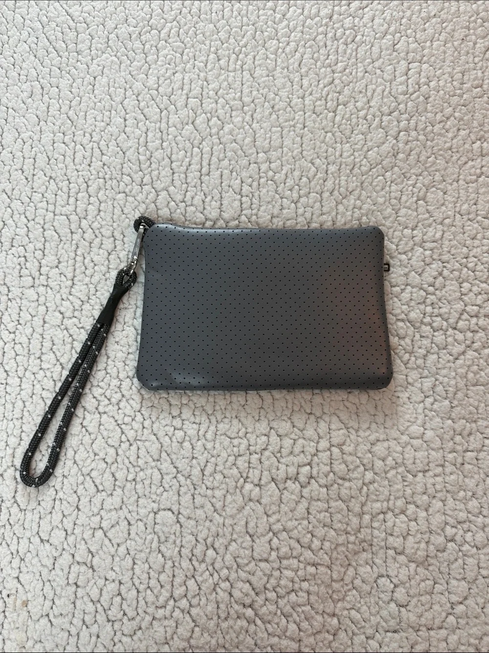 Perforated Gray Wristlet with Stripe Accent